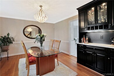 Dining room located off the foyer has built in cab