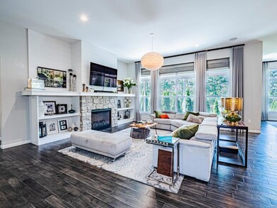 11 foot ceilings and dramatic windows throughout t