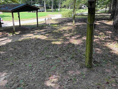 View of yard with a carport
