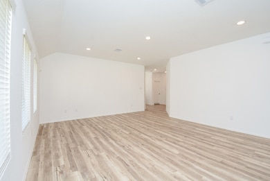 Neutral colors abound in this spacious living/dining space.