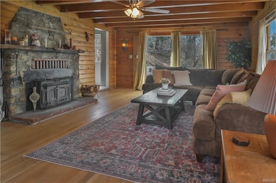 Mid Level Living room with deck and adjacent bedro