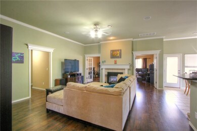 Wide open living room with beautiful wood floors. 