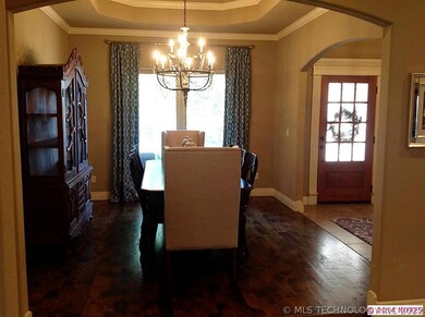 Spacious formal dining with tray ceiling