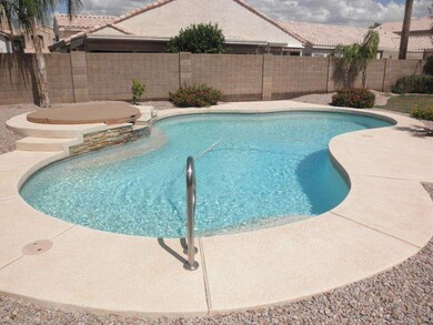 POOL AND COVERED JACUZZI
