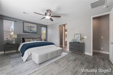 Bedroom virtually staged  wood finished floors, ce