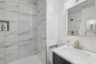 Bathroom featuring bathtub / shower combination, 