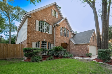 Charming curb appeal with lush lawn and welcoming