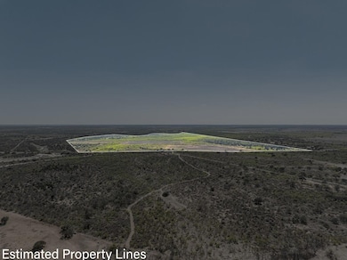 Birds eye view of property featuring a rural view