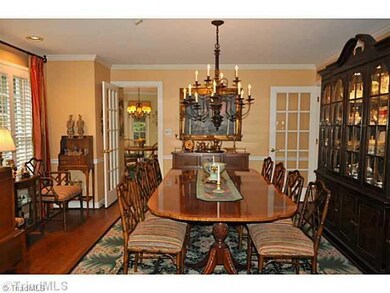 Dining Room. The spacious formal dining room with its handsome bay window can be reached from the foyer, living room or the Chef s kitchen.