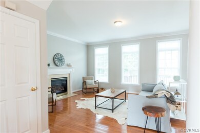 Living Room with Gas Fireplace and ample Natural L