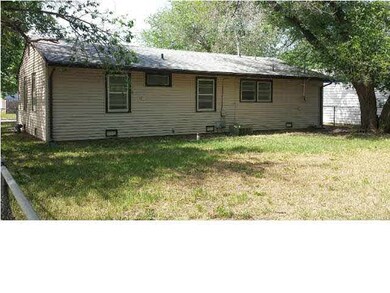 Rear of home with large back yard