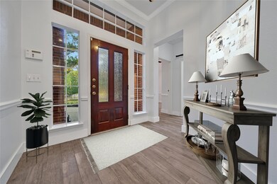 The entry is bright and welcoming with large windows around the beautiful front door and a ring doorbell to let you keep an eye on visitors at your front door.