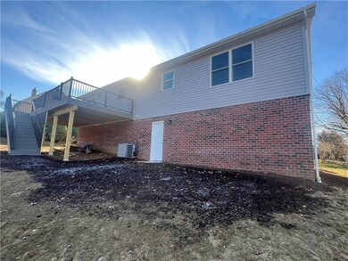 24x12 trex deck with stairs, man door to garage