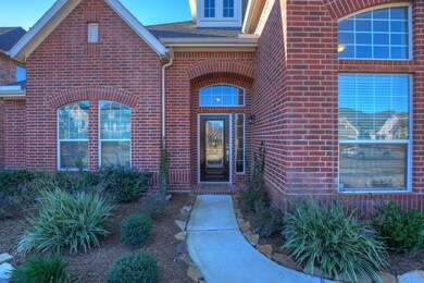 Lovely plantings in the front flower beds which are maintenance free to you since HOA provides lawn care.