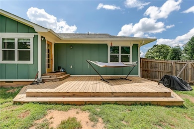 Deck featuring area for grilling