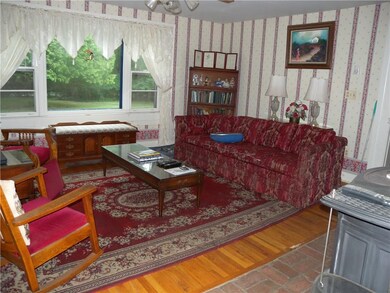 There is ample seating in the living room and a ni