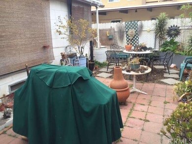 BACK PATIO BETWEEN HOUSE & GARAGE