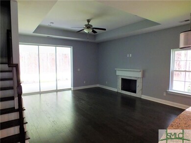 Fireplace & Tray Ceiling in Family Room. Open Conc