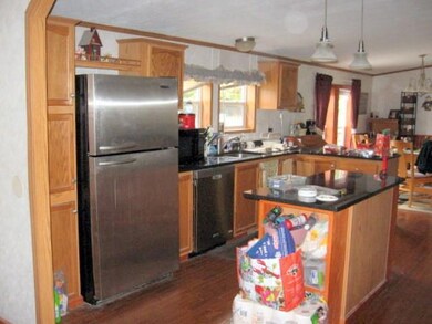 Kitchen with refrigerator,...