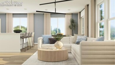 Living area featuring light hardwood / wood-style 