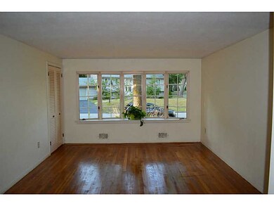 Living Room. Formal living room boasts gleaming ha