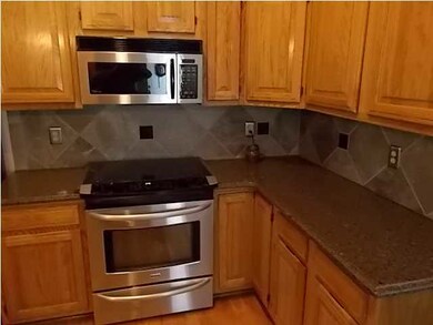 Notice the Granite Countertops and Nice Back splas
