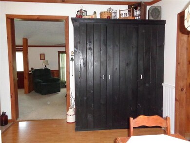 Pantry with lots of storage. Door...