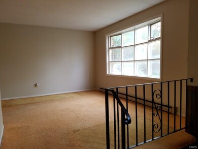 Step up from the foyer to your spacious living roo