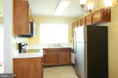 1123 Huntmaster Terrace NE unit 102, Leesburg, VA 20176 - photo 2