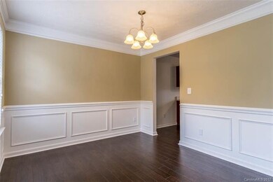Dining Room--Wainscoting and chandelier