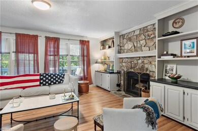 Spacious living room with wood burning fireplace!