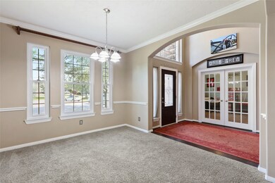 This elegant formal dining room is the perfect size for entertaining large groups and for those more intimate gatherings with plenty of room for a large dining table and sideboard.