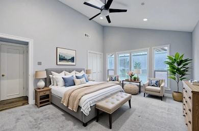Primary bedroom on 1st floor, virtually staged