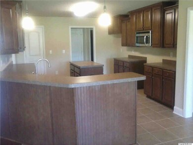 Another View of Kitchen Looking Into Living Area