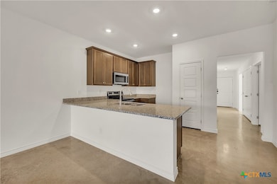 Please Note: These interior photos are not of the actual home but are of a completed one with a similar floor plan. Finishes, features, and layouts may vary.