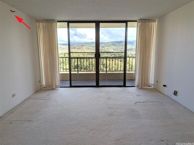 Living room view towards the golf course. Note fire sprinklers.  Enhanced