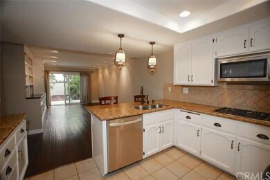 The kitchen opens to the large family room.