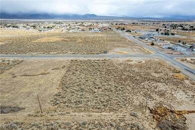 Bird's eye view with a desert view and a mountain