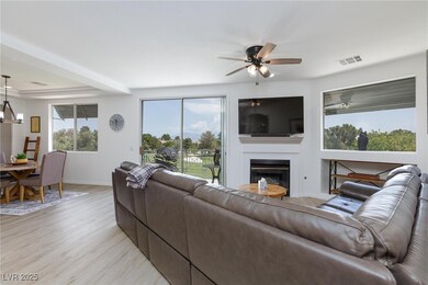 Living room with light wood-style flooring, ceilin