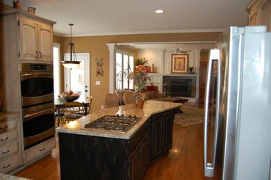 Updated Kitchen w/ HW floors and SS Appliances