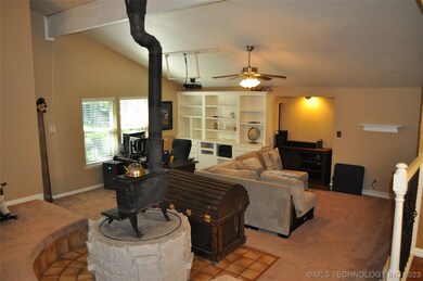 Adjacent to the family room is the game-room or me