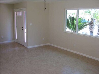 View of front door and foyer area when one enters.