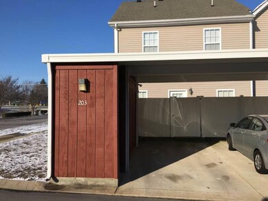 Two car carport with storage.