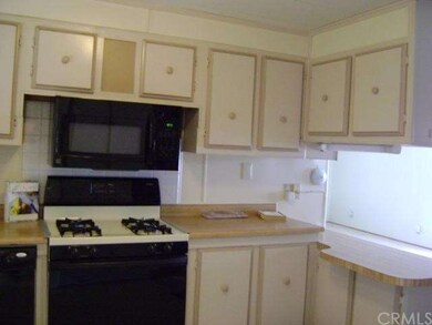 Kitchen is light and bright.  Opens to the Dining 