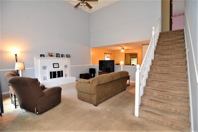 High ceilings and fireplace