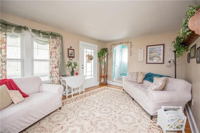 Generously sized living room with hardwood floors, notice all the natural light that is in each room of this house!