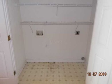 ACROSS FROM 1/2 BTH IN KITCHEN AREA