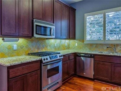 Upgraded kitchen opens to the great room.