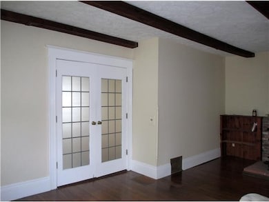 Living Room Formal living room with hardwood floor