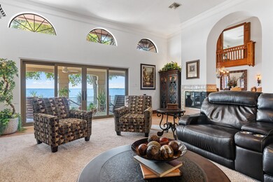 Inviting Family Room overlooks the lake and shares